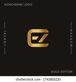 Initial Gold letters EZ linked monogram logo vector. Business logo monogram two overlap letters inside circle isolated on black background.