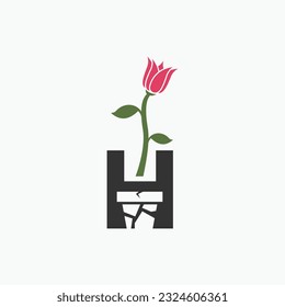 initial h with flowerpot logo design vector silhouette illustration