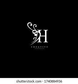 Initial H letter Unique attractive creative modern luxury beauty flourish ornament black white monogram logo. design vector logotype.