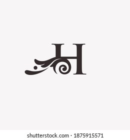 initial H logo with ornament