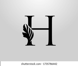 Logo Inicial De H Swirl. Vector de diseño de letras H clásicas con color negro y mano floral dibujada.