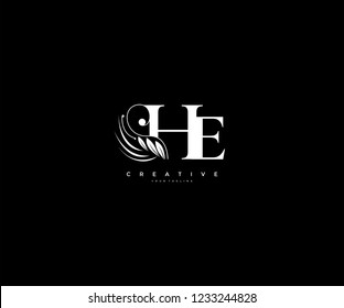 Initial HE letter luxury beauty flourishes ornament monogram logo