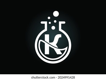 Initial K monogram alphabet with lab glass, chemical liquid, and bubbles. Lab logo design. Logo for science, and technology business and company identity