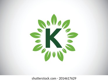 Initial K monogram letter alphabet with leaf wreath. Green leaf, flower logo design concept. Modern vector logo design for business, and company identity