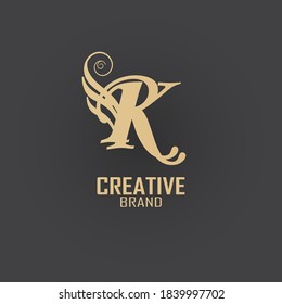 the initial kr logo is gold, inspired by the logo of luxury combined with vintage curves, making this logo elegant