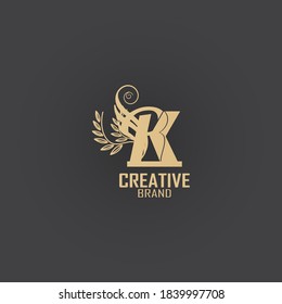 the initial kr logo is gold, inspired by the logo of luxury combined with vintage curves, making this logo elegant