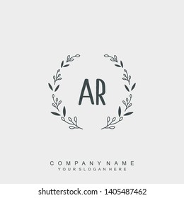 Initial letter AR beautiful handwriting logo vector template