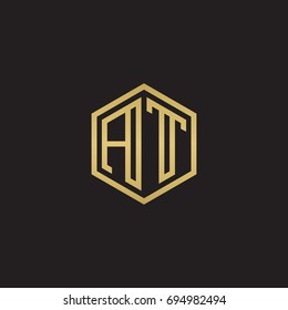 Initial letter AT, minimalist line art hexagon logo, gold color on black background