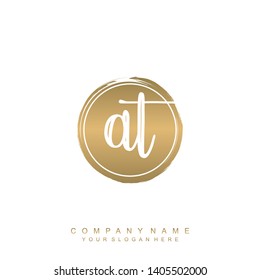 Initial letter AT beautiful handwriting logo vector template