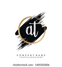 Initial letter AT beautiful handwriting logo vector template