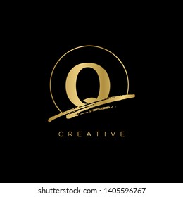 Initial Letter brush Q Monogram Sliced. Gold Logo template isolated on black background