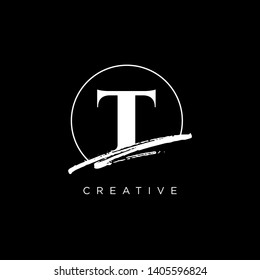 Initial Letter brush T Monogram Sliced. Logo template isolated on black background