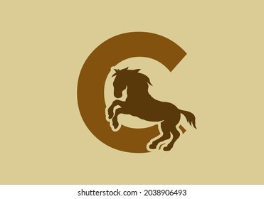 Initial letter C with horse shape design