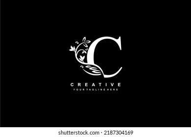 initial letter C logo design with beautiful and elegant flower and feather decoration. initial C design. icon C. design C