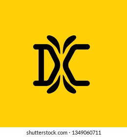 Initial letter DC logo design with tattoo style