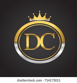 initial letter DC logotype company name with oval shape and crown, gold and silver color. vector logo for business and company identity.