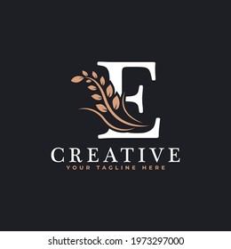 Initial Letter E Linked Monogram Golden Laurel Wreath Logo. Graceful Design for Restaurant, Cafe, Brand name, Badge, Label, luxury identity
