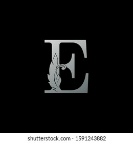 Initial  Letter E Logo Icon Luxury Feather. Monogram silver design concept  luxury feather element and letter logo icon for corporate, lawyer, notary, firm and more brand identity.