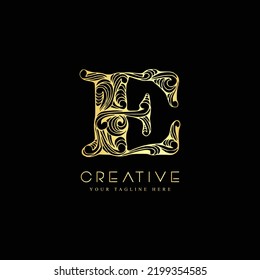 Initial letter E luxury beauty flourishes ornament logo template.