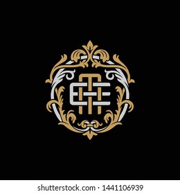 Initial letter E and M, EM, ME, decorative ornament emblem badge, overlapping monogram logo, elegant luxury silver gold color on black background