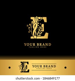 Initial letter E with natural logo vector concept element, letter E logo with floral ornament.
