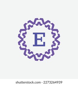 initial letter E ornamental modern circle frame emblem logo