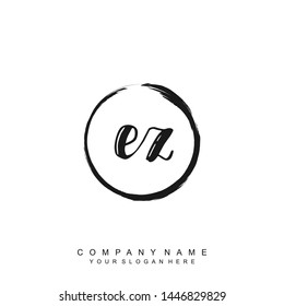 Initial letter EZ beautiful handwriting logo vector template