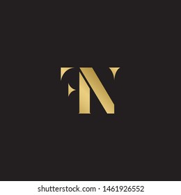 Initial letter f n uppercase modern logo design template elements. Gold letter Isolated on black  background. Suitable for business, consulting group company.
