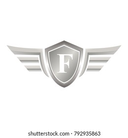 initial letter F shield logo with wings vector illustration