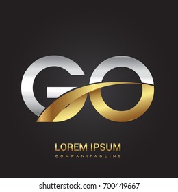 initial letter GO logotype company name colored gold and silver swoosh design. isolated on black background.