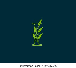 Initial I letter with green leaves logo