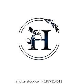 Letra inicial H Flores botánicas con círculo grabado a mano. Adecuado para la marca natural, ecológica, joyería, moda, personal o corporativa.