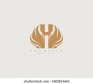 Initial Letter H Elegant Flaming Wings Emblem Monogram