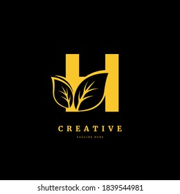 Letra inicial H con el elemento de concepto del vector del logotipo de hoja, logotipo de letra H con hoja orgánica. Apto para empresa, etiqueta de producto, placa o negocio.