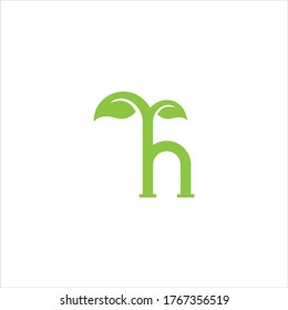 Initial Letter H With Leaf Luxury Logo. Green leaf logo Template vector Design.

