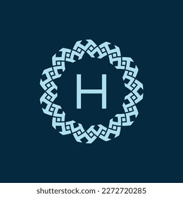 initial letter H ornamental emblem frame circle pattern logo