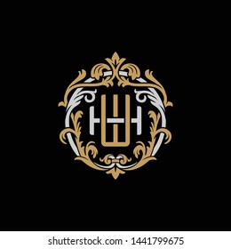 Initial letter H and W, HW, WH, decorative ornament emblem badge, overlapping monogram logo, elegant luxury silver gold color on black background