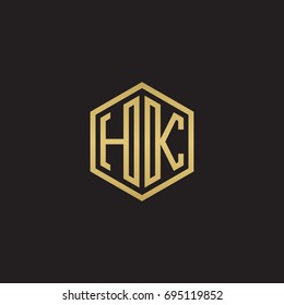 Initial letter HK, minimalist line art hexagon logo, gold color on black background