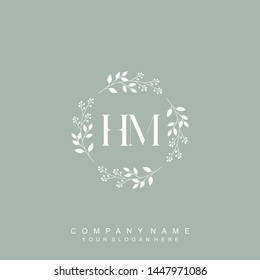 Initial letter HM beautiful handwriting logo vector template