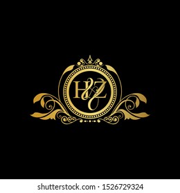 Initial letter HZ logo luxury vector mark, gold color elegant classical symmetric curves decor.