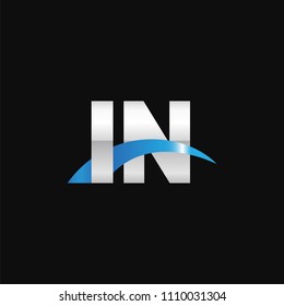 Initial letter IN, overlapping movement swoosh logo, metal silver blue color on black background