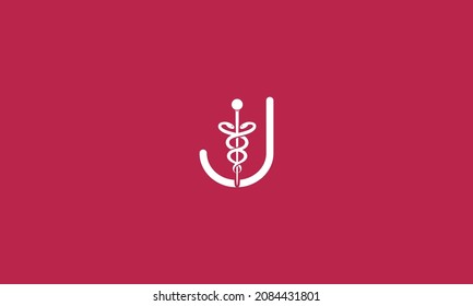 Letra inicial J incorporada con el diseño del logotipo médico de Caduceus