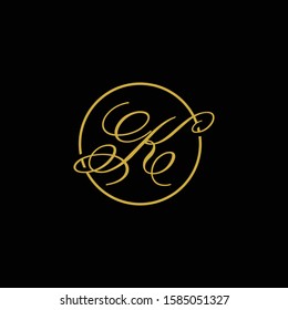 initial letter k circle script logo gold color