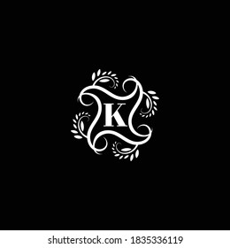 Initial Letter K Flourish circle monogram logo.