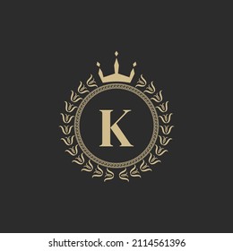 Initial Letter K Heraldic Royal Frame with Crown and Laurel Wreath. Simple Classic Emblem. Round Composition. Graphics Style. Art Elements for Logo Design Vector Illustration