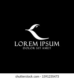 Initial letter K logo template with bird on negative space and leaves gothic symbol in flat design monogram illustration