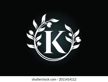 Initial letter K sign symbol with olive branch wreath. Round floral frame made by the olive branch. Agriculture industry logo design vector template. Olive oil label