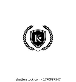 Initial Letter K with star and shield logo design vector.