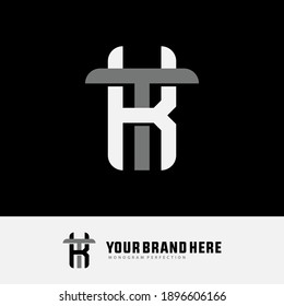 Initial letter K, T, KT or TK overlapping, interlock, monogram logo, white and gray color on black background