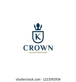 Initial Letter K Vintage Logo Design with Crown, Shield and Feather Icon Illustration